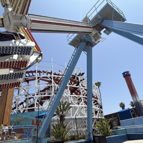 A ride at Belmont Park is shown with the Giant Dipper in the background on June 24, 2025.