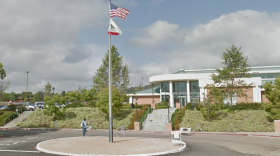 A student walks near the entrance to the Grossmont-Cuyamaca Community College District in this undated photo. 