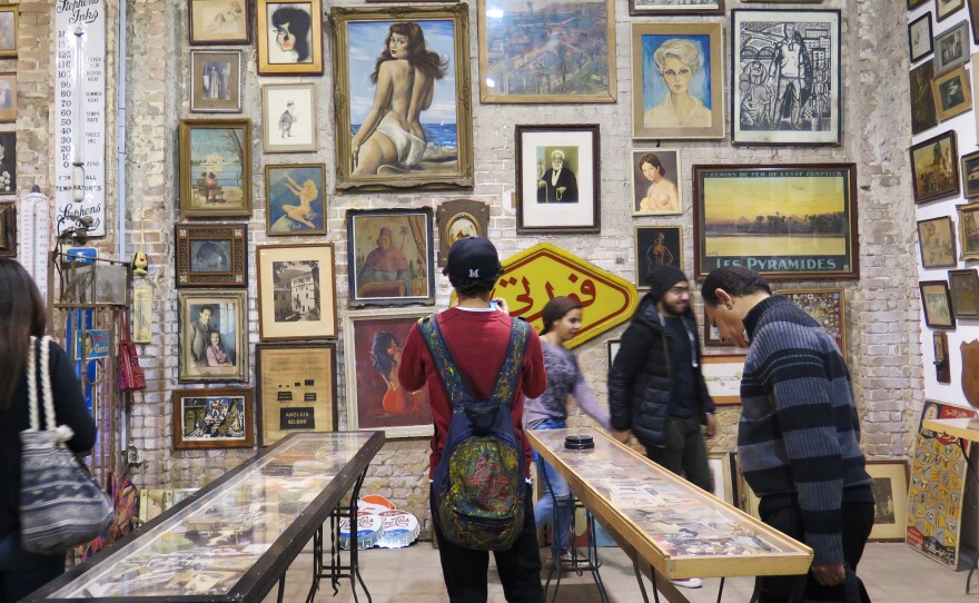 Some of the paintings and pictures Amgad Naguib has collected over the years were displayed recently at a Cairo gallery. "When I walk into a place — a basement or a villa or an apartment — and I find a thick layer of dust," Naguib says, "my heart starts beating faster."