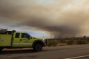 A fire truck heads toward the York Fire on July 30 in the Mojave National Preserve, Calif.