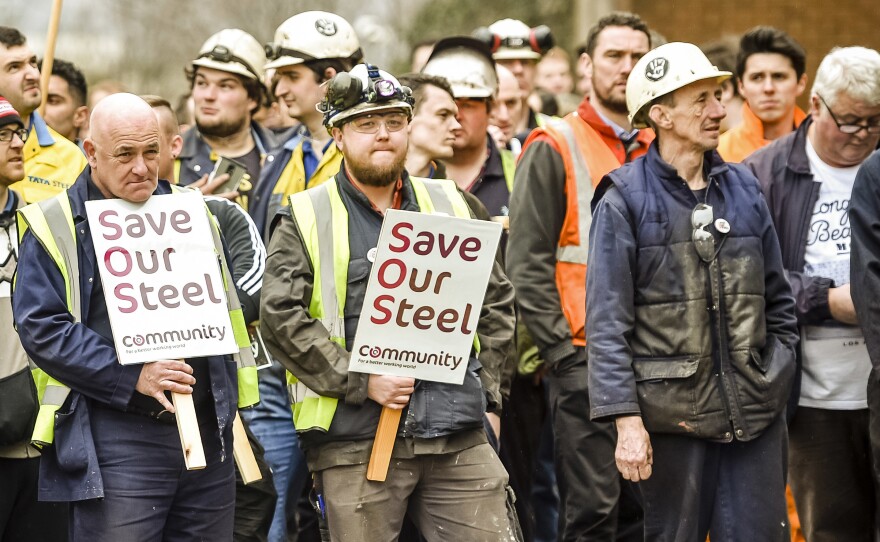 Workers gather at the Tata Steel plant in Port Talbot, Wales, on April 1. The company had put its British business, including the plant, up for sale. Once Brexit was approved, Tata announced it was putting the sale on hold.