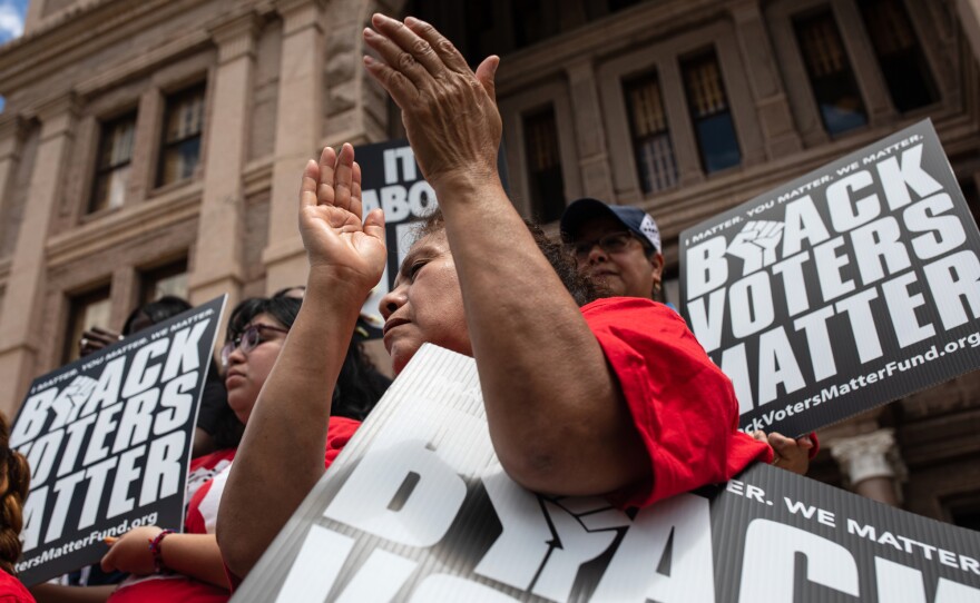 Demonstrators gather outside of the Texas State Capitol in Austin during a voting rights rally on July 8.