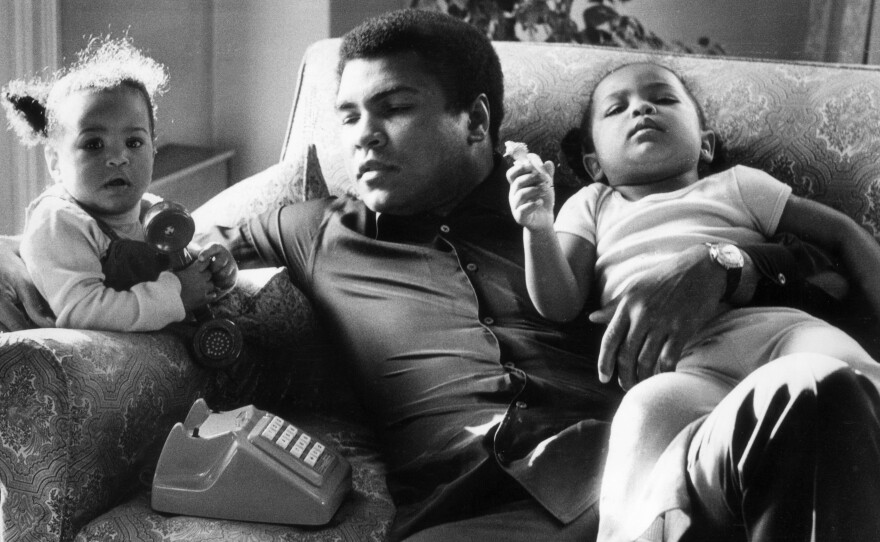 Fans and family are mourning boxer Muhammad Ali, who died at age 74. He's seen here in 1978 with his daughters Laila (9 months) and Hanna (2 years).