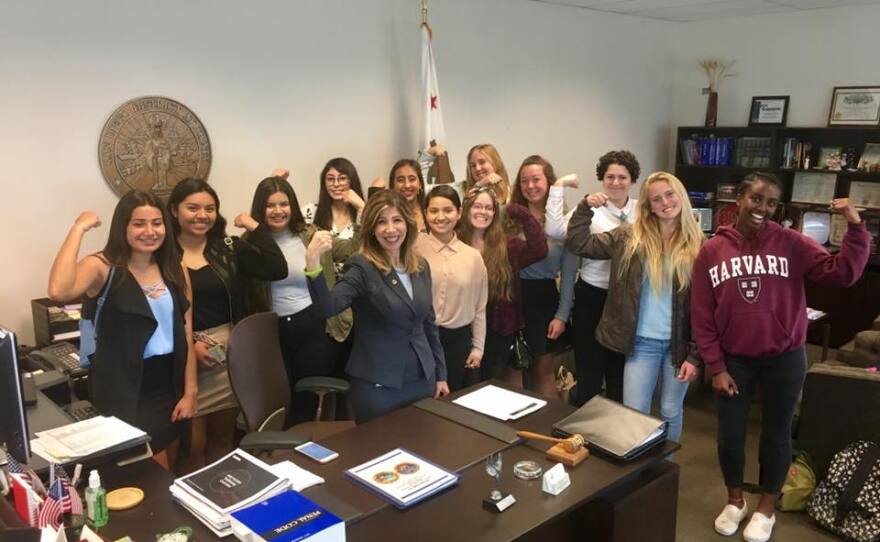 Appointed Interim San Diego County District Attorney Summer Stephan poses in this undated photo with high school students during a job shadowing event.