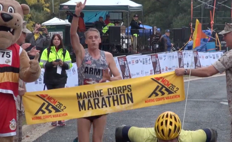 2nd Lt. Trevor Lafontaine celebrates after winning the the 40th annual Marine Corps Marathon, Oct. 25, 2015.