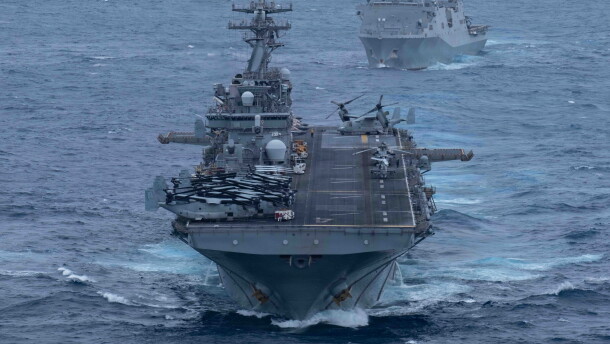 Wasp-class amphibious assault ship USS Boxer (LHD 4), front, and San Antonio-class amphibious transport dock ship USS Portland (LPD-27), sail in formation in the U.S. Central Command area of responsibility, June 30, 2026.