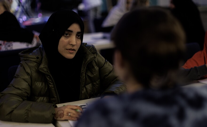 Abida Muslim, 23, during an evening English class for refugees and asylum seekers in Chandler, Ariz., on Dec. 8, 2022.