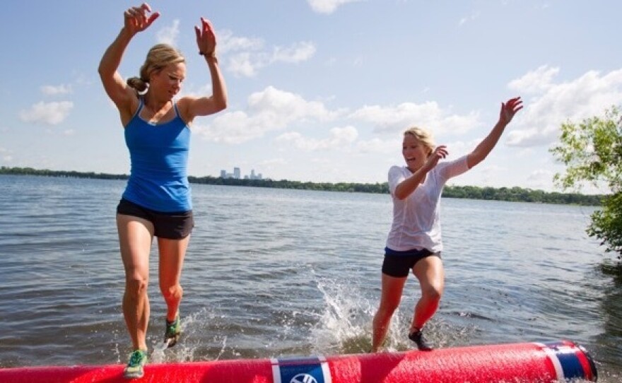 Lizzie Hoeschler Horvitz,  left, rolling on a Key Log against Abby Hoeschler in 2014.