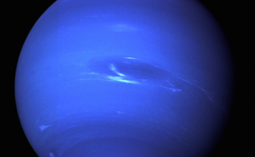 Neptune typically appears blue in photographs due to methane gas in the atmosphere. This image of the ice giant was taken in 1989 by the Voyager 2, the only spacecraft to travel to the planet.