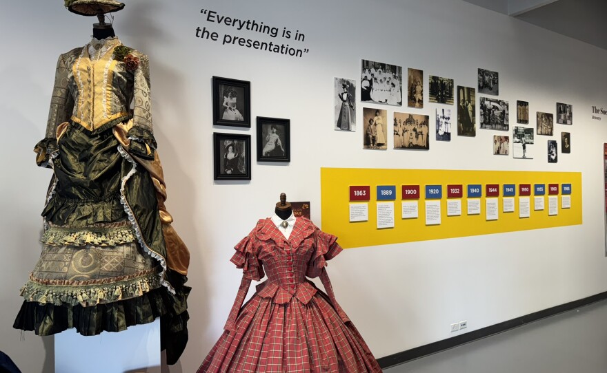 Two dresses are seen in the "Clothes Story" exhibit currently showing at the Mesa College Art Gallery, Sept. 4, 2025.