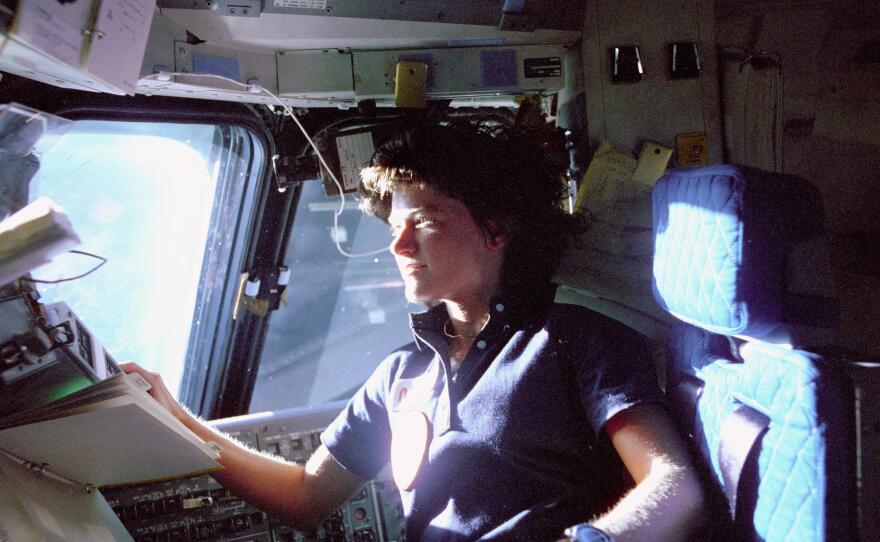 Sally Ride in the pilot chair of the space shuttle after launching into history as America’s first female astronaut, June 18, 1983.