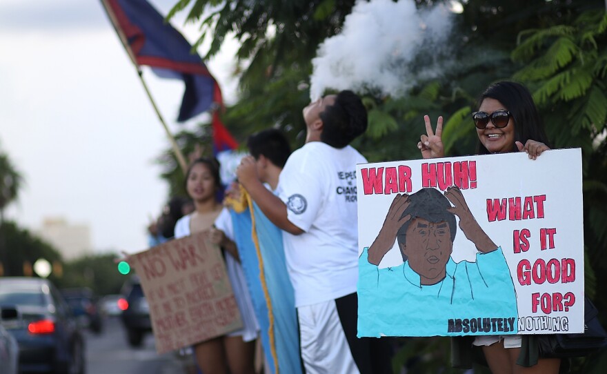 As the date for North Korea's missile launch toward Guam approached, protesters held a peace rally in Hagatna, Guam. On Tuesday, North Korea's regime opted not to launch missiles toward the U.S. territory.