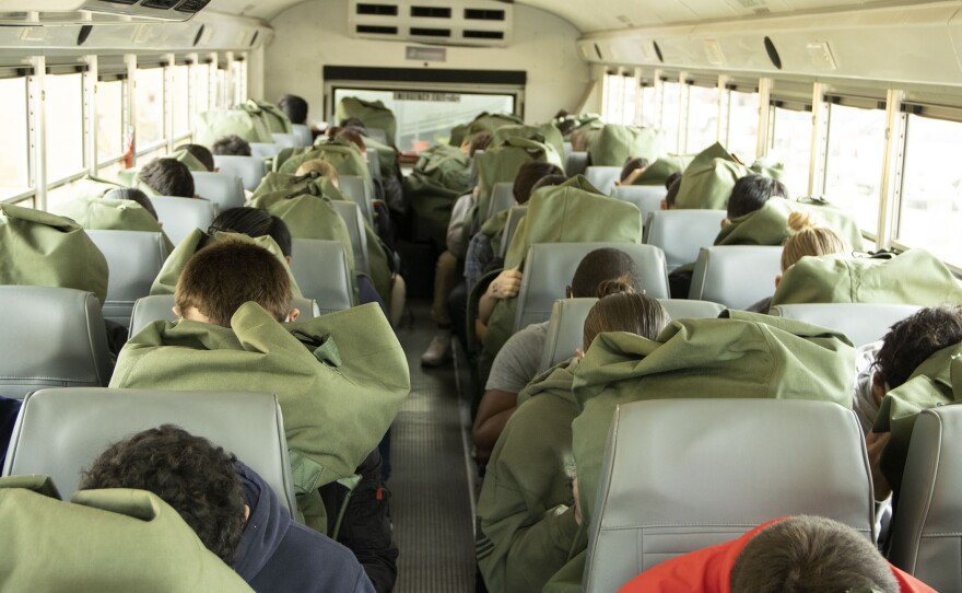 Marine recruits being bussed to Marine Recruit Depot San Diego, Feb. 9, 2021.