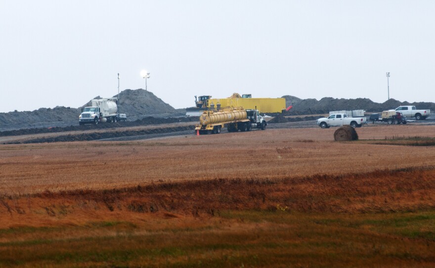 Cleanup went on Friday at the site of an oil pipeline leak and spill north of Tioga, N.D. Officials took nearly two weeks to tell the public about the break in a Tesoro Corp. pipeline.