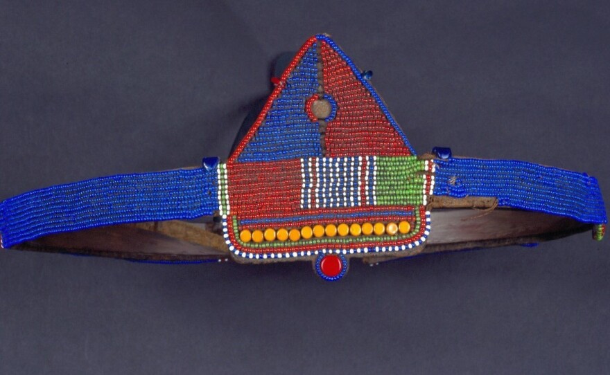 A man's belt, known as "Enkeene Pus," from the Maasai region of Tanzania and dating to the mid-20th century.