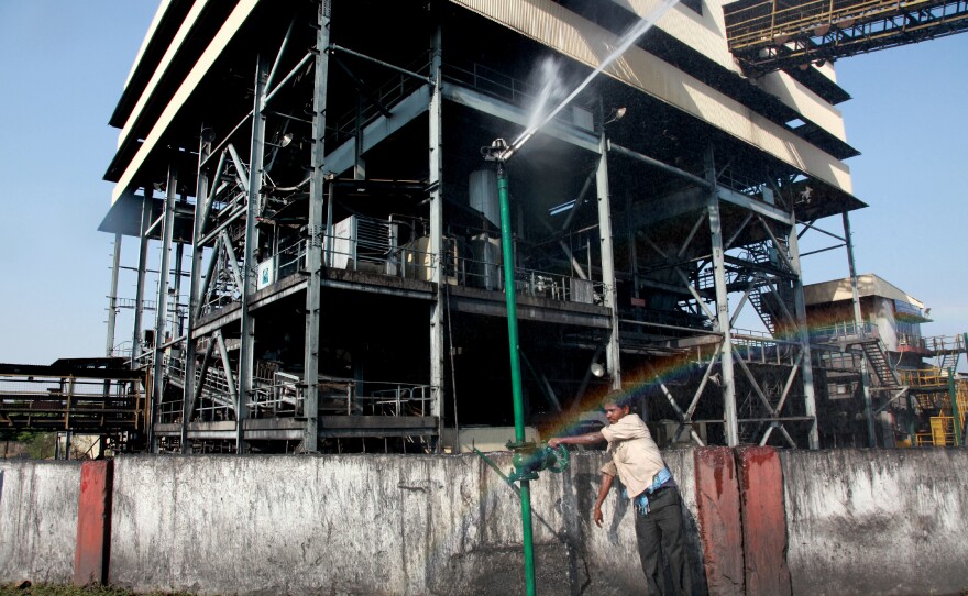 At the Piparwar Open Cast Project outside Jharkhand state's capital city, coal is watered down at a "washery" as an environmental measure. Indian coal has a high ash content, and washing the coal reduces pollutants that are released into the air during transport. Much of India's coal is transported unwashed.
