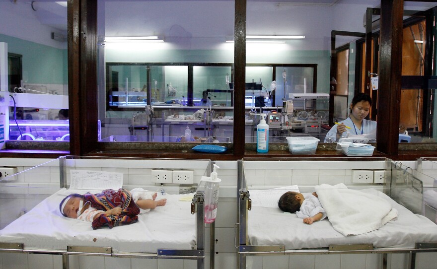 Newborns are treated at a pediatric hospital in Hanoi, Vietnam. The rates of childhood mortality have improved in Hanoi but remain high in more rural parts of the country.