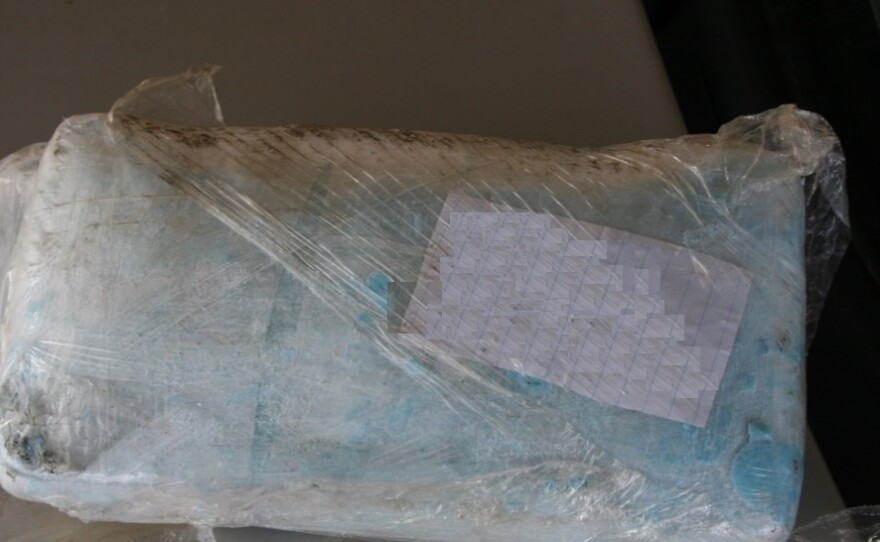 Above: US Border Patrol Agents confiscated this package of narcotics from the scene, March 3, 2014.