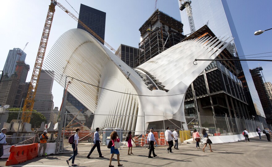 Pedestrians pass through the intersection of Greenwich and Fulton streets at the World Trade Center in 2015. The intersection was closed in the 1960s as the first World Trade Center was constructed. The $3.9 billion transportation hub, designed by Spanish architect Santiago Calatrava, now dominates the intersection.