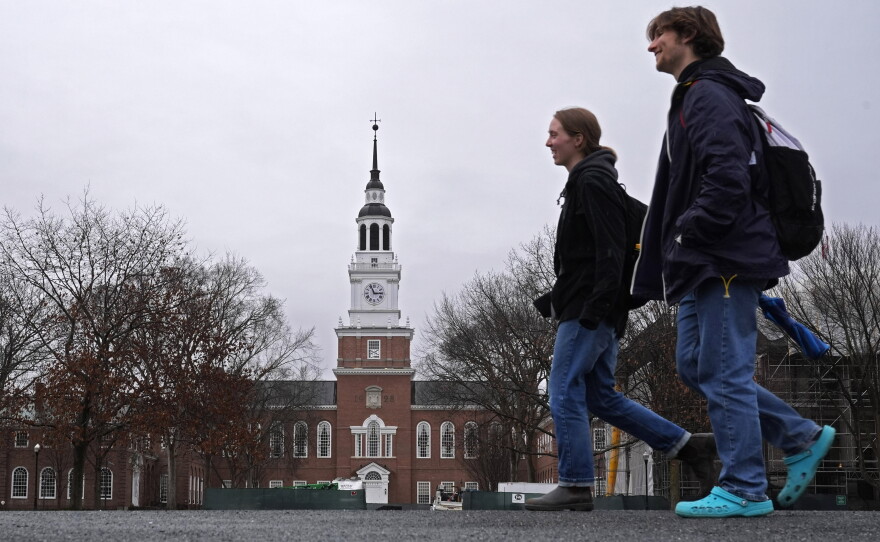 Students cross the campus of Dartmouth College in Hanover, N.H., in 2024.