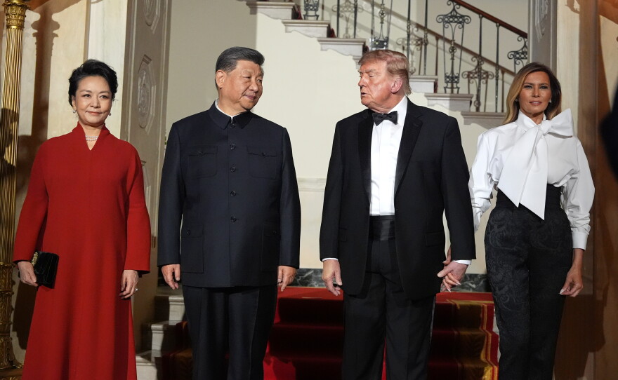 President Donald Trump and first lady Melania Trump pose for a photo with China's President Xi Jinping and his wife Peng Liyuan in the Grand Foyer of the White House during a State Dinner, Thursday, Sept. 24, 2026, in Washington.