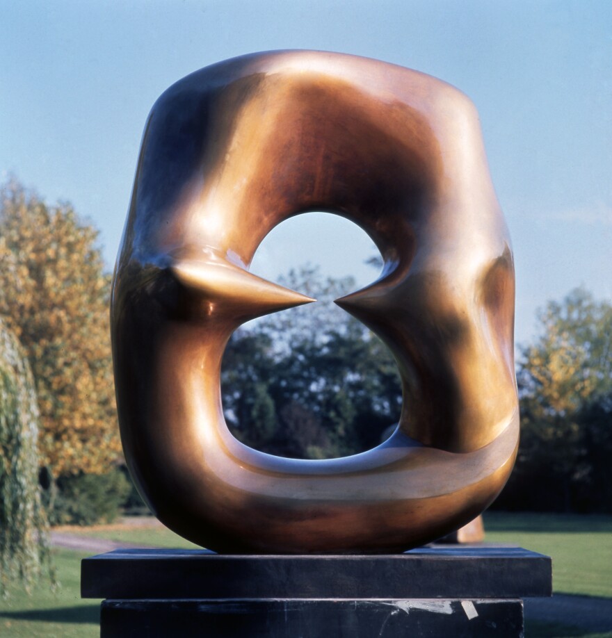 Henry Moore's "Working Model for Oval with Points" (1968-69) is shown in an undated photo.