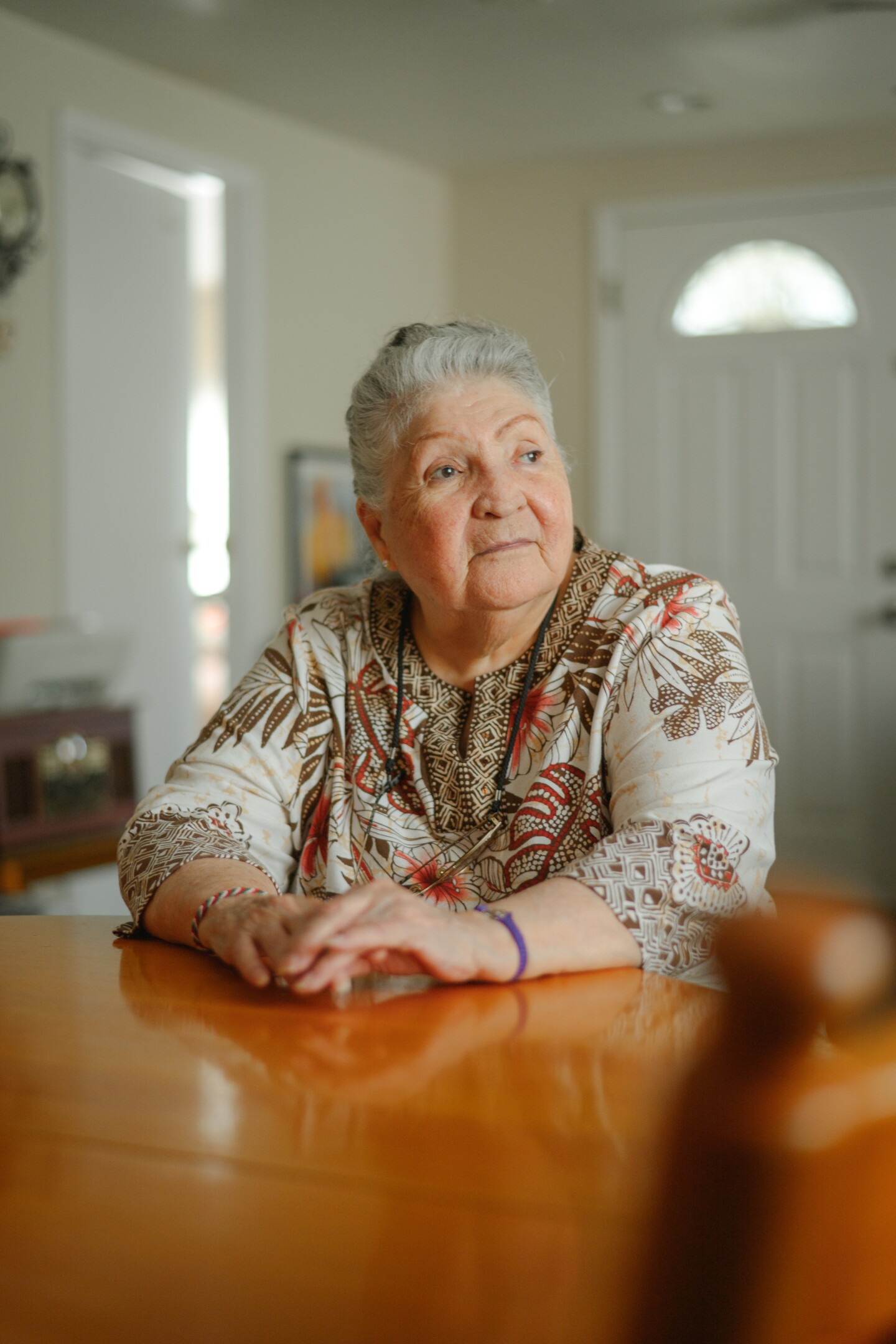 Margarita Garcia sits for a portrait at her home in the Old Town neighborhood of National City, California on June 27, 2025.