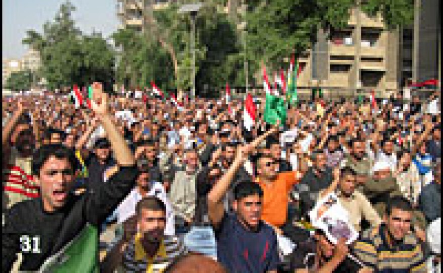 Shiite cleric Muqtada al-Sadr and his followers argue that the security pact has no legitimacy because it was negotiated by an Iraqi government under U.S. occupation. Chanting "No Invaders," they called for the immediate withdrawal of U.S. forces.