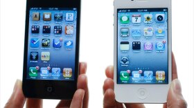 New Apple iPhones are shown at the Apple Worldwide Developers Conference, June 7 in San Francisco.