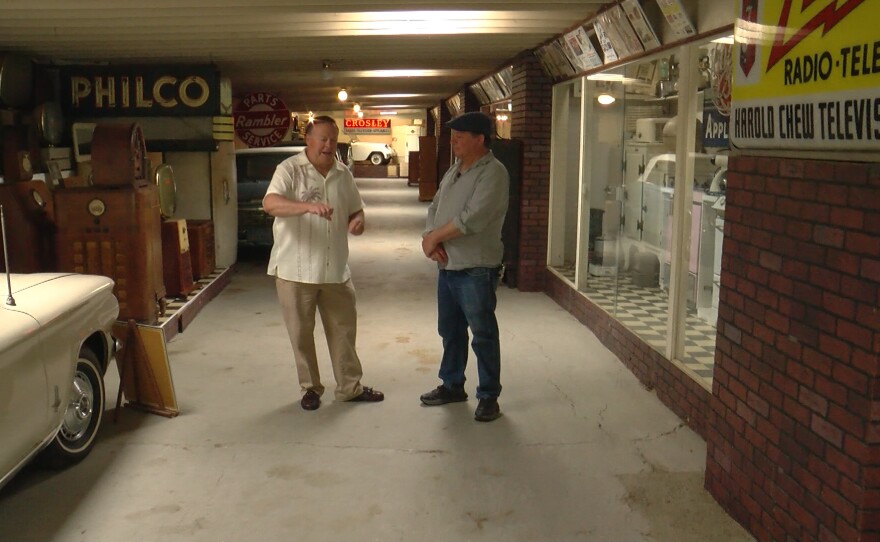 KPBS reporter John Carroll speaks with Clark Knapp at the Deer Park Winery & Auto Museum on June 27, 2024
