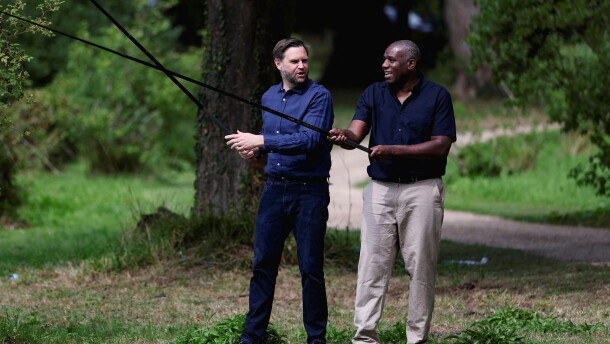 Britain's Foreign Secretary David Lammy, right, and US Vice President JD Vance fish in a lake in the grounds of Chevening House in Kent, England, Aug. 8, 2025.