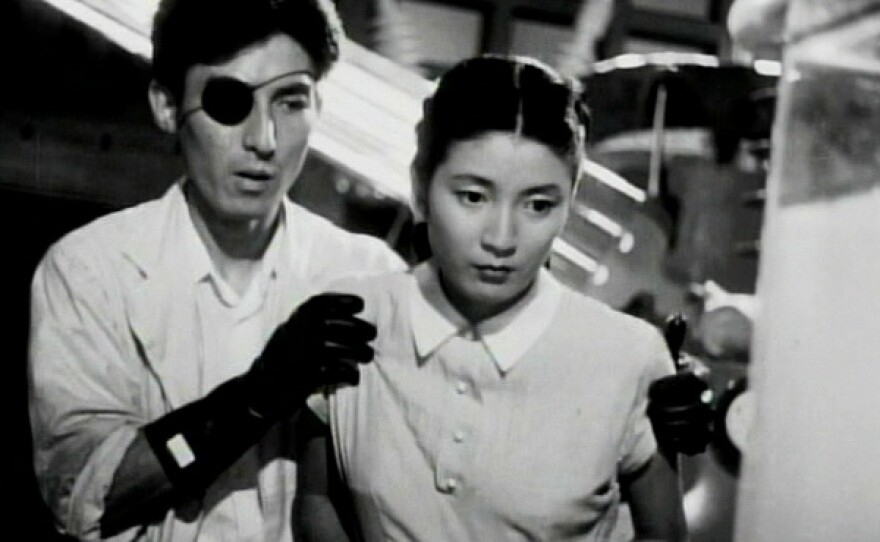 Akihiko Hirata as Dr. Serizawa and Momoko Kôchi as Emiko in 1954's "Godzilla," the film was released as a badly recut and badly dubbed American version known as "Godzilla, King of the Monsters."