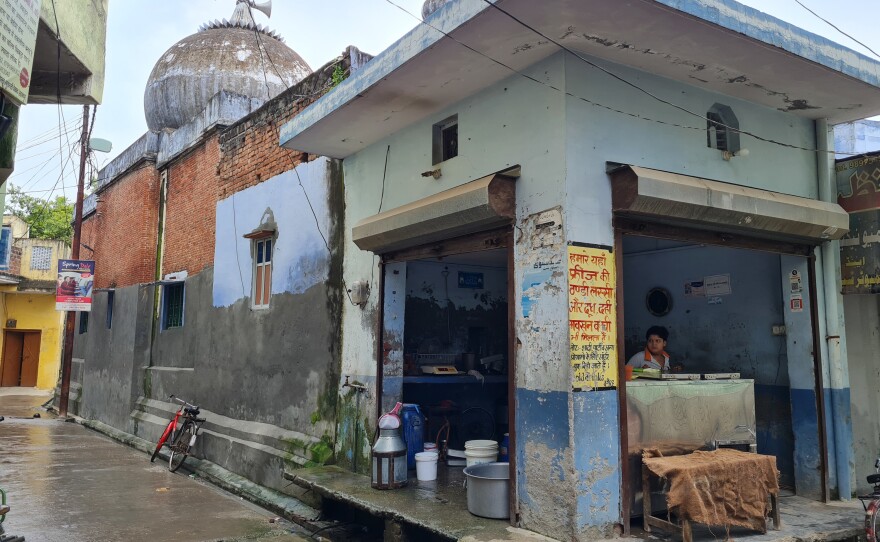 Tea stalls in a market outside the gates of the Darul Uloom seminary in Deoband, India.