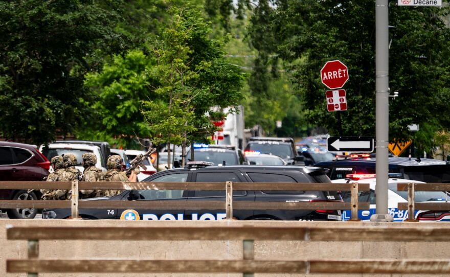 Montreal police work the scene of a shooting in Montreal on Monday, June 22, 2026.