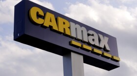 A sign at the CarMax dealership in Manchester, N.H., Thursday, Aug. 15, 2019.