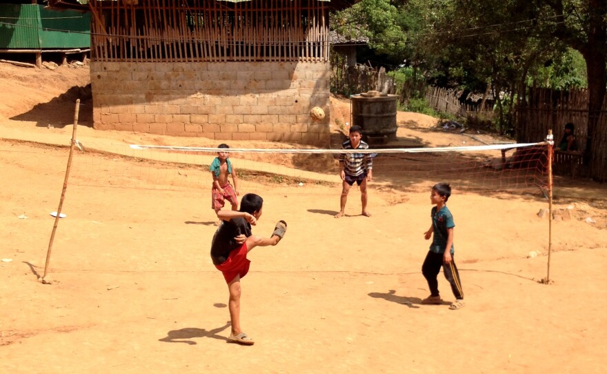 Making do in a Burmese refugee camp, Thailand.
