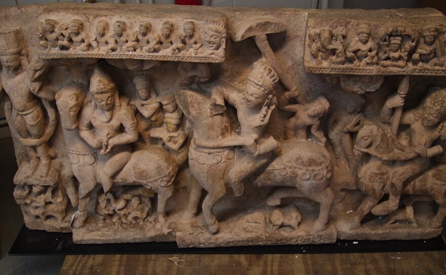 A sandstone panel depicting a very rare representation of the equestrian deity, Revanta, and his entourage, from India, in the 8th Century A.D. It is valued at approximately $300,000.