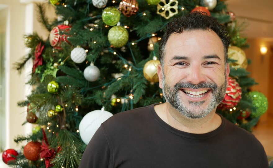 Puerto Rican merengue singer Joseph Fonseca says he wrote a holiday song about generators to bring joy to people suffering through a long hurricane recovery that has left thousands dependent on generators for power.