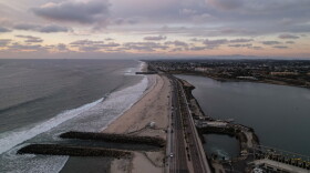 A drone view shows the Carlsbad desalination plant's intake lagoon on the right and the discharge canal on the left, Tuesday, Dec. 2, 2025, in Carlsbad, Calif.