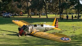A small plane lies where it crash-landed on Penmar Golf Course in the Venice area of Los Angeles, March 5, 2015