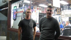Andrew Bell and Jerry Dixon, Marines based at Camp Pendleton, stand outside a barber's chop in Oceanside as they talk about their reactions to Bin Laden's death. 