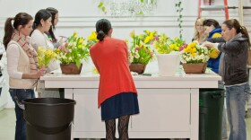 Tam Ashworth teaching one of Isaris Flower Studio's floral design classes.