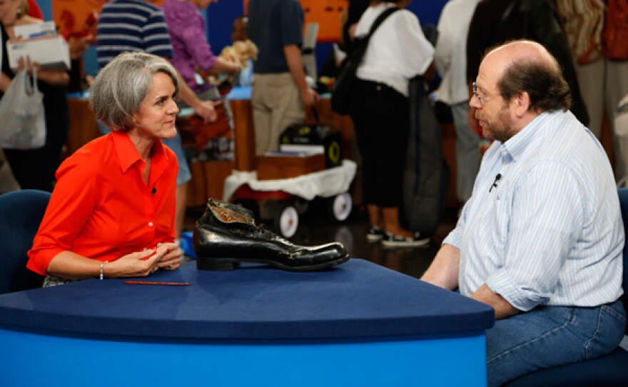 Deborah Miller appraises Robert Wadlow's custom shoe, ca. 1934, for $1,500 to $2,500 in Knoxville, Tennessee.