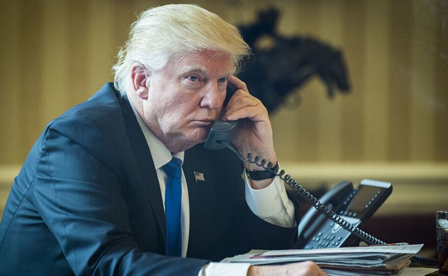 President  Trump speaks on the phone with Vladimir Putin, Russia's president, during the first official phone talks in the Oval Office last Saturday.