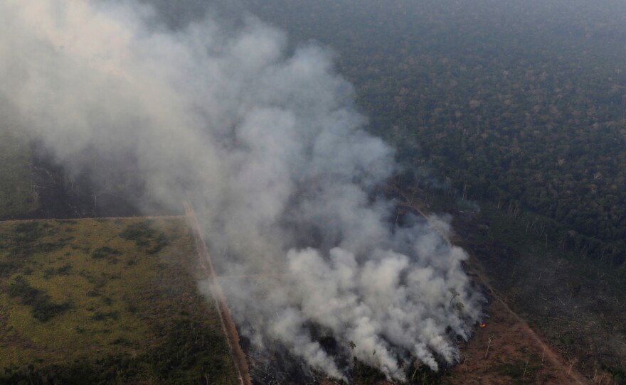 Smoke billows during a fire in an area of the Amazon rainforest near Porto Velho, Rondonia State, Brazil, on Wednesday.