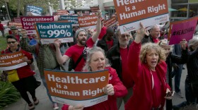 In this April 26, 2017, file photo, supporters of single-payer health care march to the Capitol in Sacramento, Calif. 