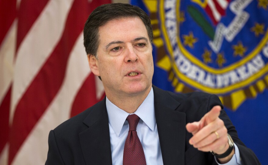FBI Director James Comey speaks at FBI headquarters in Washington.