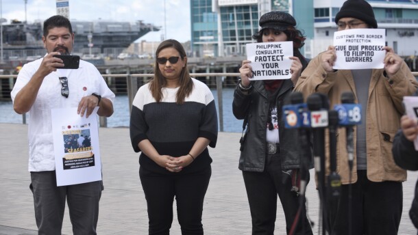 From left to right, Benjamin Prado, an organizer with Unión del Barro, former Disney Cruise passenger Dharmi Mehta and two unidentified activists are pictured at the B Street Pier on May 5, 2026.