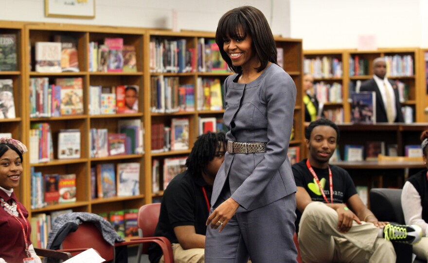 First lady Michelle Obama greets students at Harper High School in Chicago on Wednesday. Twenty-nine current or former Harper students have been shot in the past year; eight of them fatally.