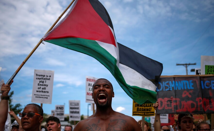 Demonstrators wave the Palestinian flag and chant "Black Lives Matter," among other slogans, during a march ahead of the Republican National Convention in Cleveland in 2016.